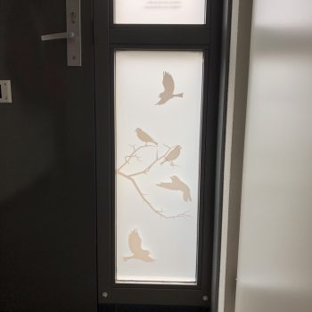 a door with birds on it