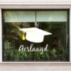 Geslaagd Hoed sticker 1 a window with a picture of a graduation cap
