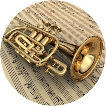 a trumpet on a sheet of music