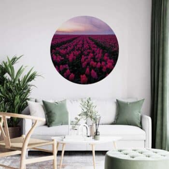 Muurcirkel tulpenveld a room with a couch and a flower field