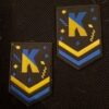 Embleem K Geel-Blauw 2 Embleem K Geel-blauw