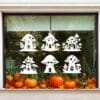 Herbruikbare raamsticker herfst – paddenstoelhuisjes