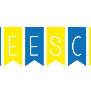 a blue yellow and green flag with black text