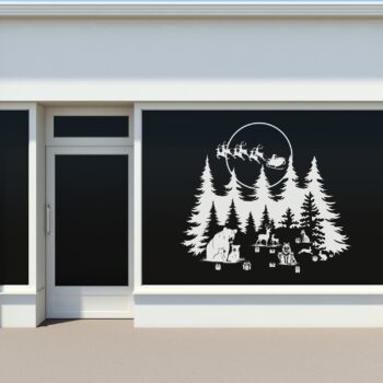 Herbruikbare raamsticker Kerstman boven het winterbos in wit op een etalageraam