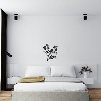 Muursticker bloesemtakje boven het bed in de slaapkamer