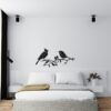 Muursticker kuifvogel en vogeltje boven het bed in de slaapkamer