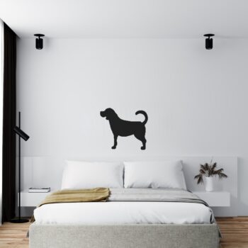 Muursticker labrador boven het bed in de slaapkamer
