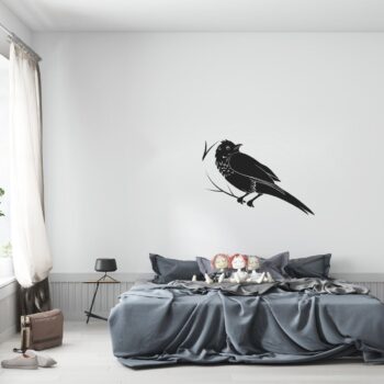 Muursticker lijster boven het bed in de slaapkamer