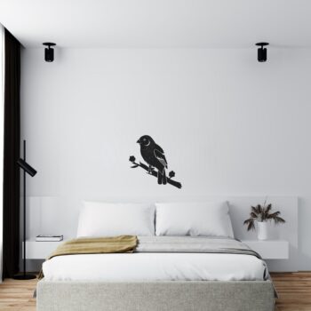 Muursticker spreeuw boven het bed in de slaapkamer
