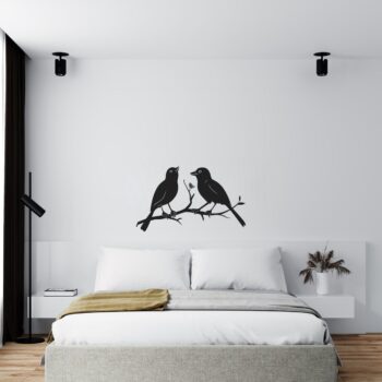 Muursticker zingende vogels boven het bed in de slaapkamer