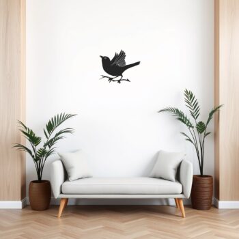 Muursticker vogel met vleugel boven de bank in de woonkamer