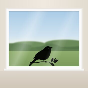 Muursticker vogel op takje als raamsticker op het raam