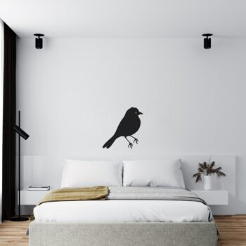 Muursticker vogeltje boven het bed in de slaapkamer