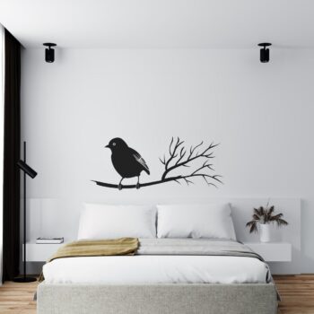 Muursticker vogeltje op lange tak boven het bed in de slaapkamer