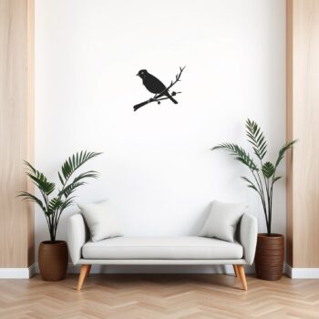 Muursticker vogeltje op tak boven de bank in de woonkamer