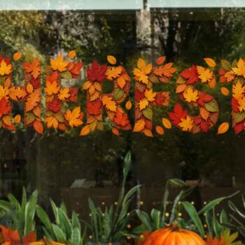 Detail van de full colour raamsticker HERFST van rode, oranje en gele herfstbladeren