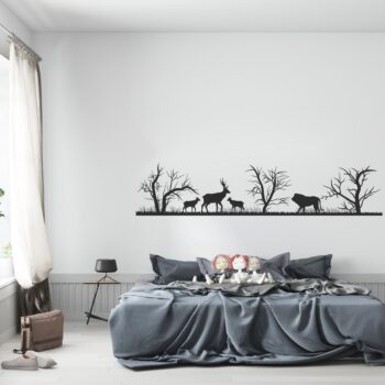 Muursticker herten en leeuw boven het bed in de slaapkamer
