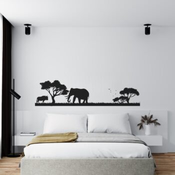 Olifant muursticker boven het bed in de slaapkamer
