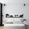 Muursticker struisvogels boven het bed in de slaapkamer