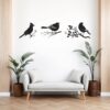 Vogelstickers set boven de bank in de woonkamer